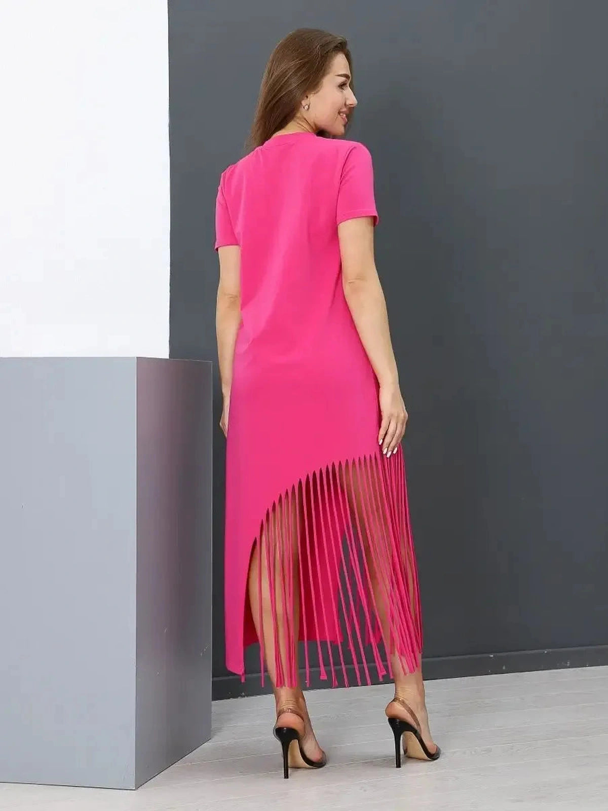 Capri Midi Dress by Lauven, fuchsia cotton jersey dress with fringe hem, showcasing effortless elegance and comfort.