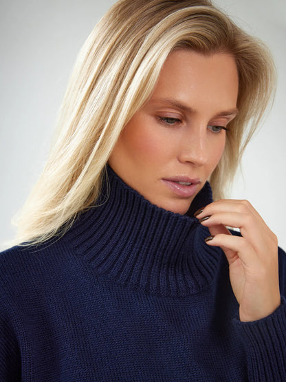 Celeste Sweater by Lauven, oversized women's wool knit turtleneck in dark navy, showcasing cozy elegance and style.