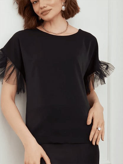 Noiré Blouse - Elegant black blouse with tulle ruffle detail by Lauven, perfect for warm seasons.