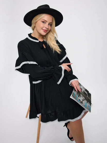 Noiré Mini Dress by Lauven, featuring elegant ruffles and lace trim, perfect for modern elegance and comfort.