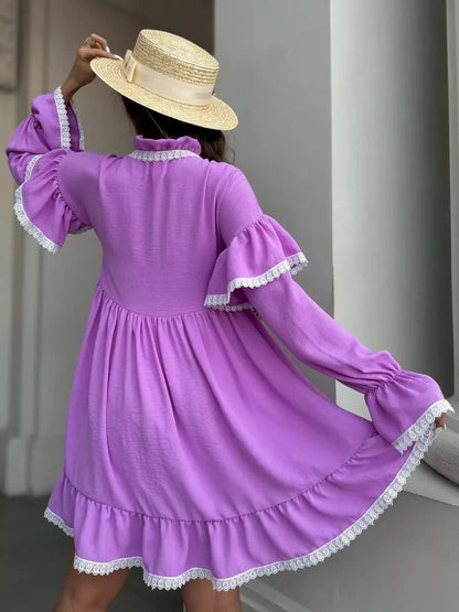 Violetta Mini Dress by Lauven, featuring delicate lace trim and flowing ruffles, in a beautiful lilac color.