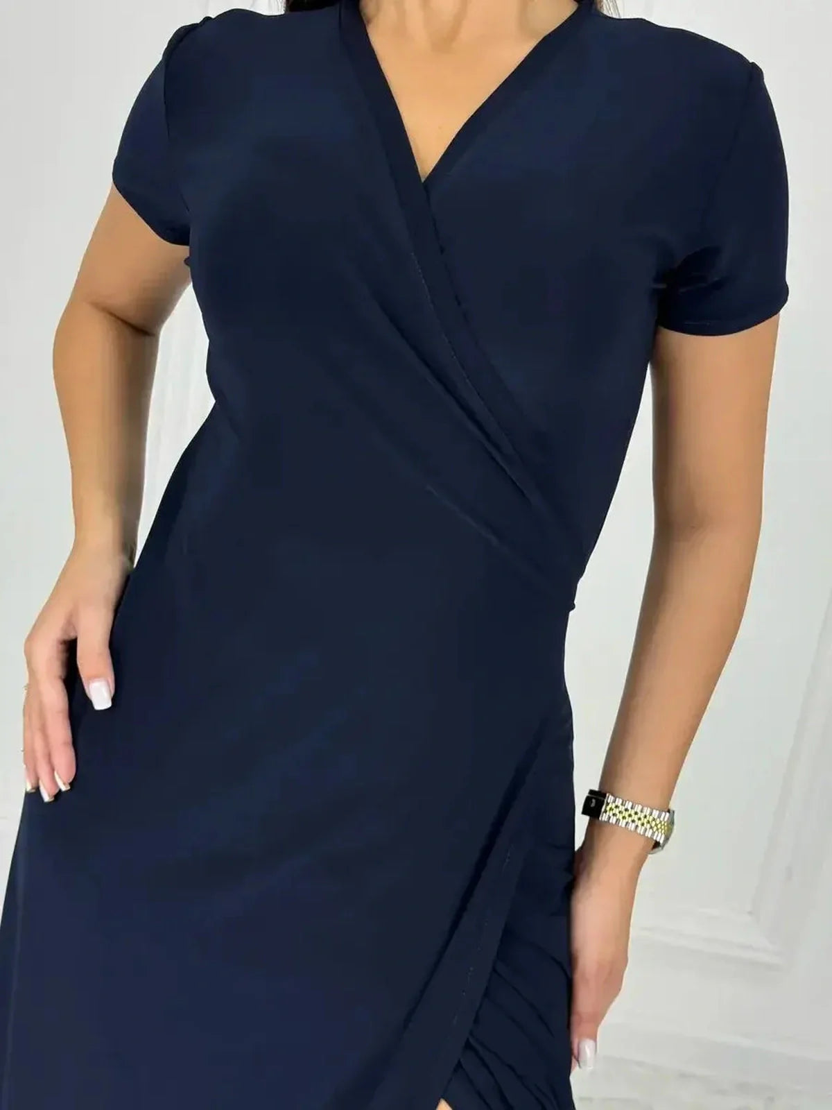 Eclipse Maxi Dress showcasing sleek wrap bodice and side slit, emphasizing modern elegance and femininity.