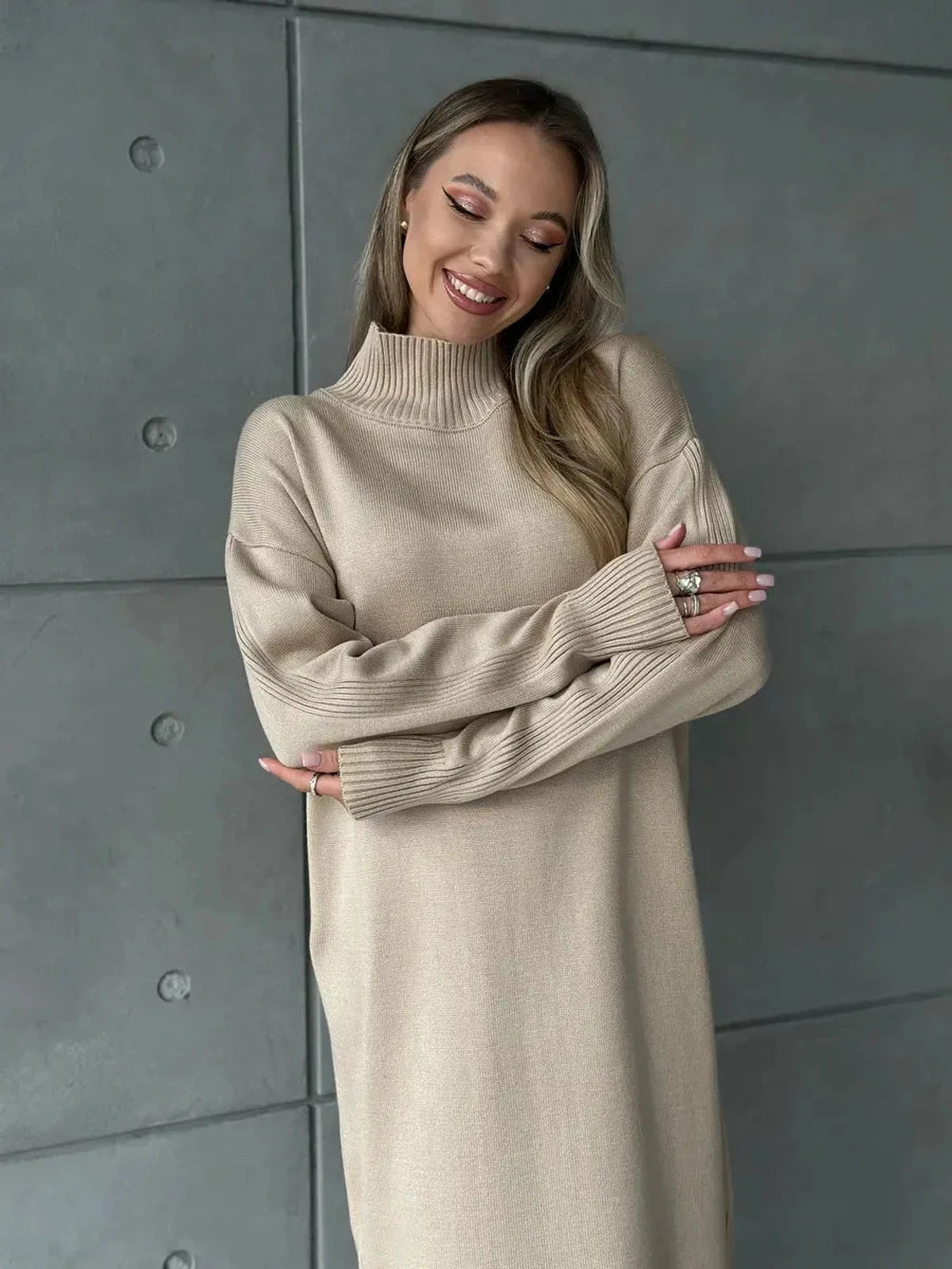 Lauven Seren Midi Dress in classic beige, featuring a high-neck collar and relaxed silhouette for modern elegance.