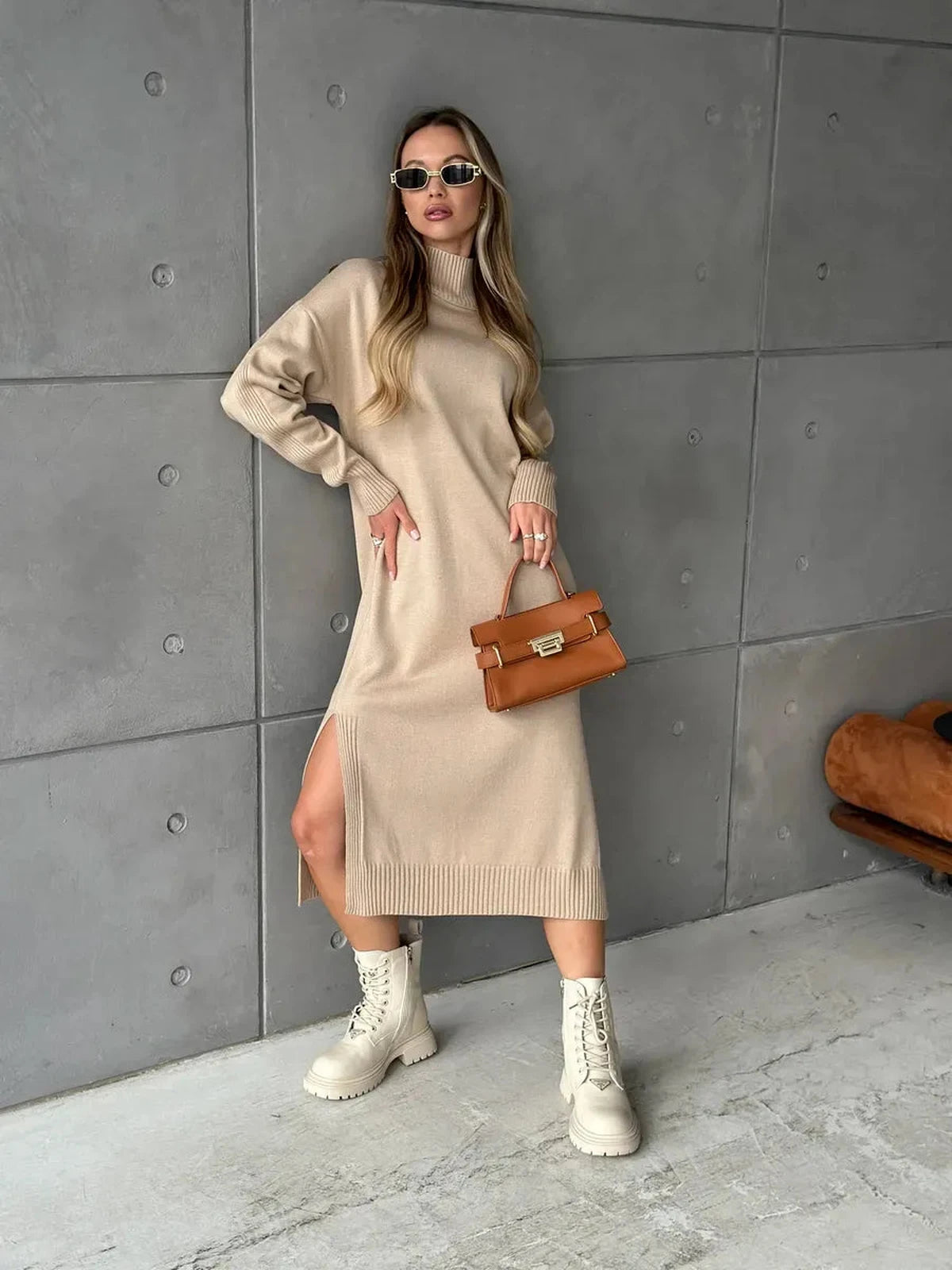 Seren Midi Dress by Lauven showcased in beige with a high-neck collar, long sleeves, and a relaxed silhouette.