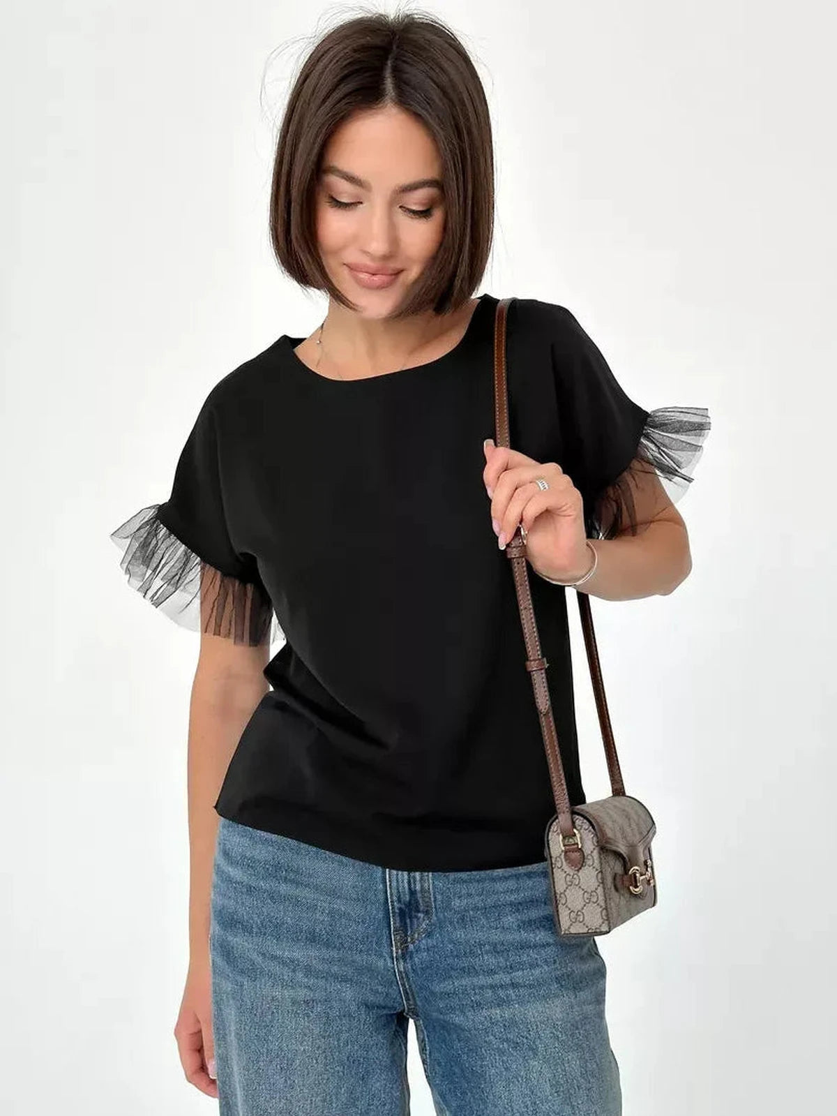 Noiré Blouse by Lauven - Elegant short sleeve black blouse with tulle ruffle detail.