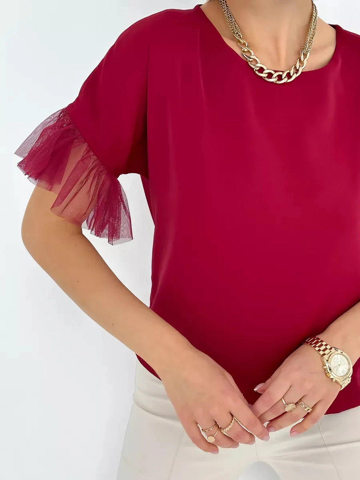 Velora Blouse by Lauven in burgundy with sheer ruffle sleeves, showcasing elegance and femininity.