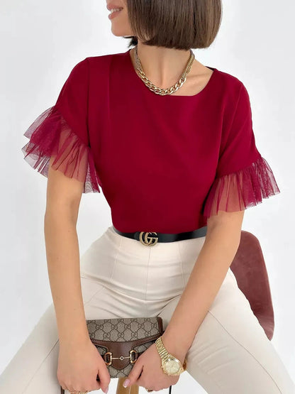 Velora Blouse by Lauven in burgundy with sheer ruffle sleeves, showcasing elegance and comfort.