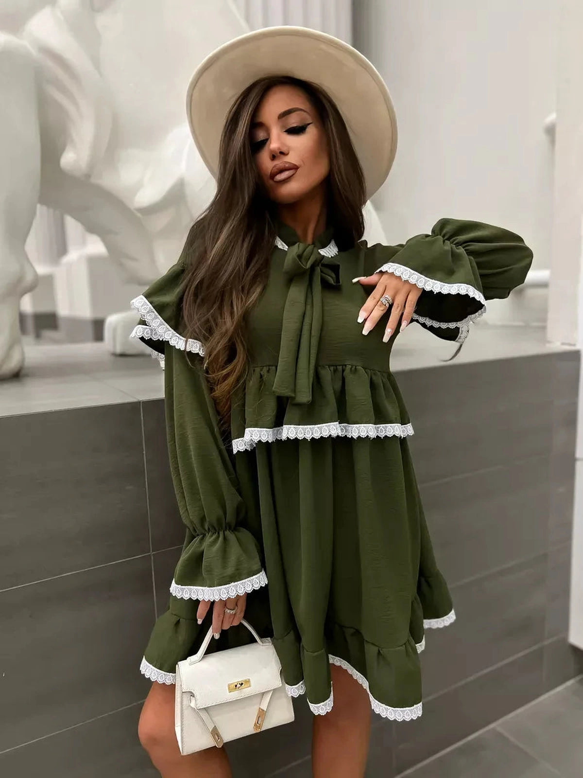 Olivea Mini Dress by Lauven featuring romantic ruffles and lace trim in khaki, perfect for a chic, comfortable style.