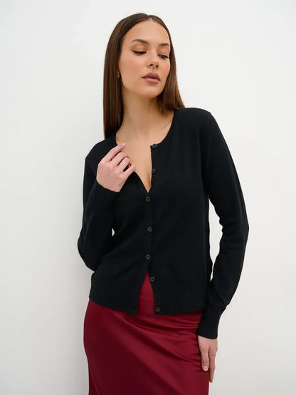 Model wearing Lauven Orion Cardigan in sleek black, featuring button closure and a stylish straight cut.