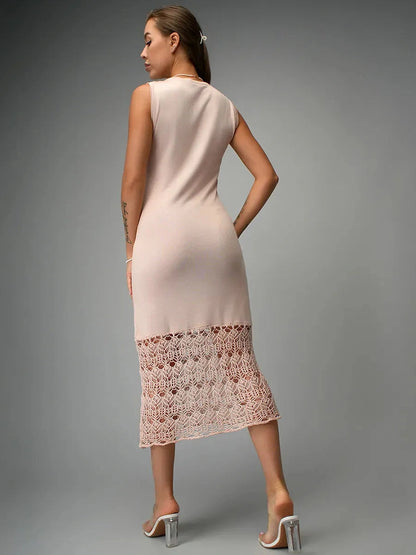 Elara Midi Dress by Lauven, showcasing a beautiful beige knit design with romantic crochet detailing from the back.