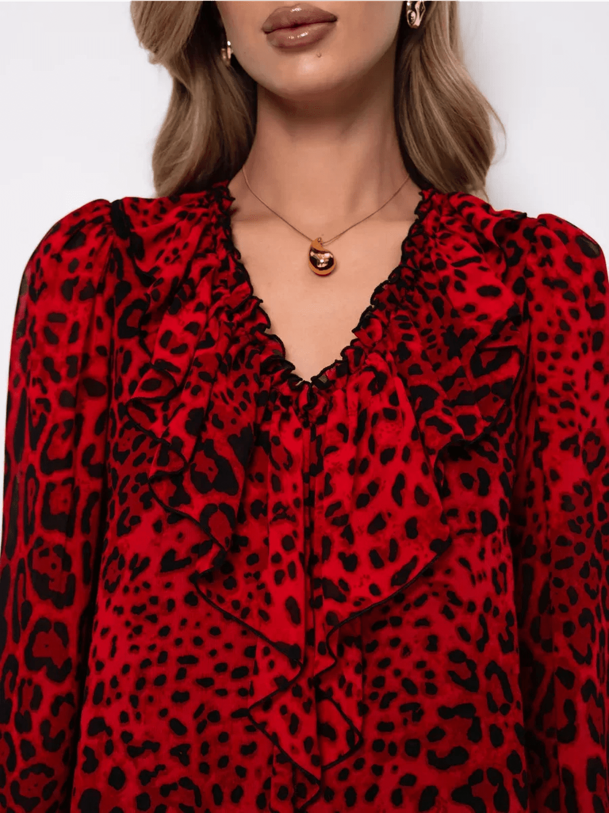 Savanna Mini Dress by Lauven in red leopard chiffon with ruffles, showcasing bold elegance and feminine style.