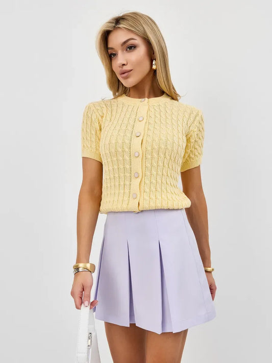 Solara Cardigan by Lauven in breathable cotton-acrylic knitwear, featuring a soft yellow color and short sleeves.