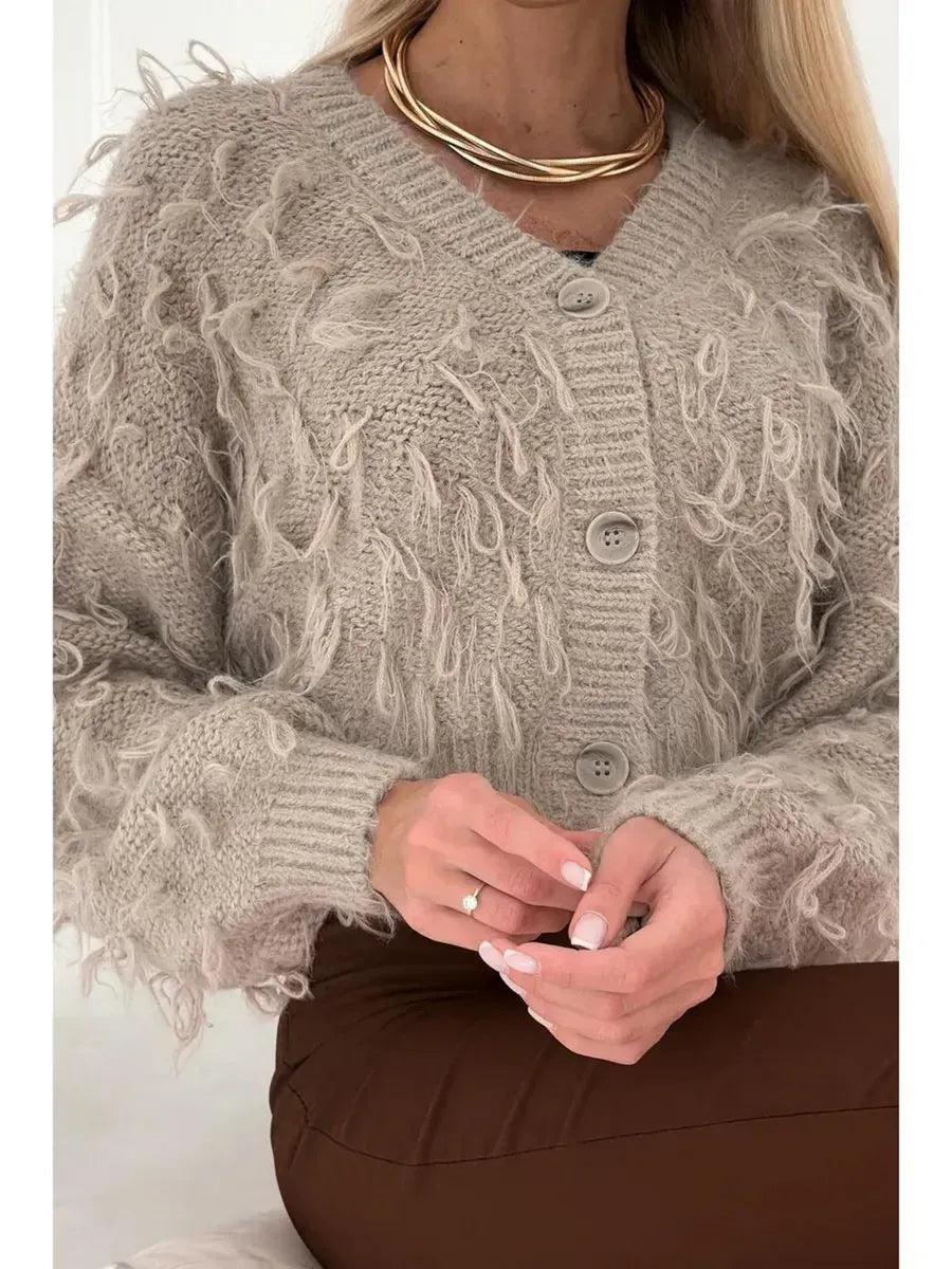 Sahara Cardigan by Lauven - Cropped oversized beige bouclé knit with feathered fringe and V-neckline.