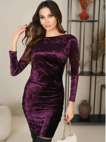 Lyra Mini Dress by Lauven in luxurious purple velvet, featuring a sculpted bodycon fit and long sleeves.
