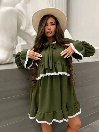 Olivea Mini Dress by Lauven, featuring romantic ruffles and lace trim in a chic khaki color.