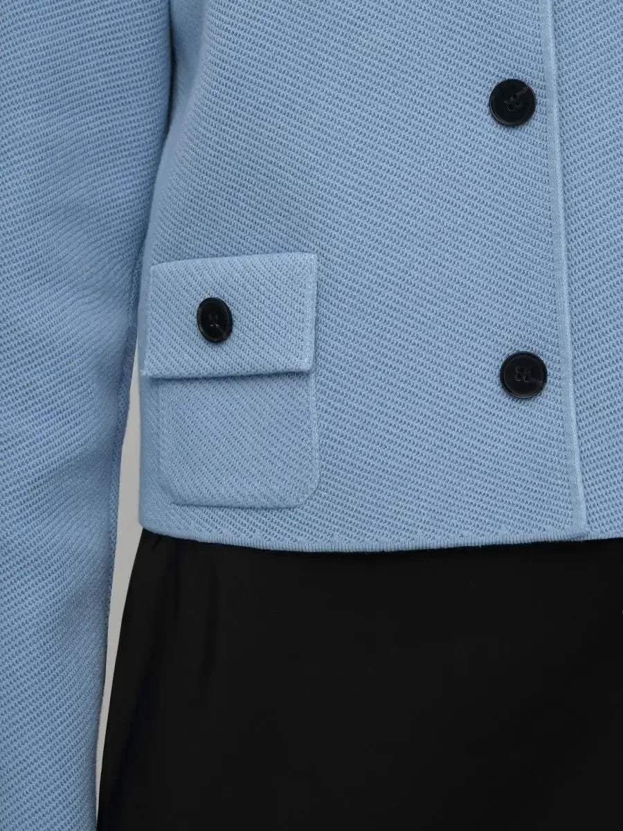 Lazio Jacket by Lauven - cropped light blue women's jacket with button closure and front pocket detail.