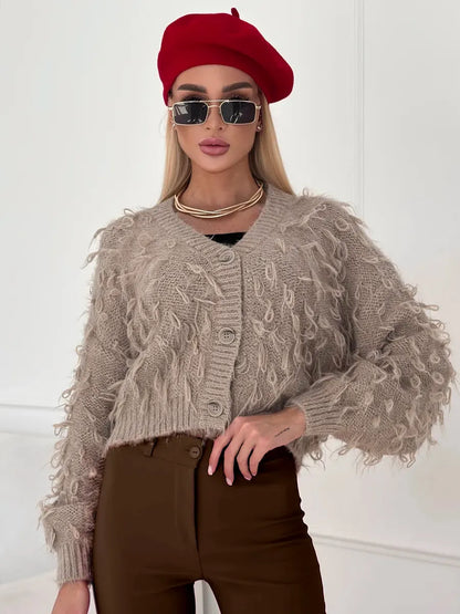 Sahara Cardigan by Lauven - Cropped oversized beige bouclé knit with feathered fringe for a trendy and cozy style.