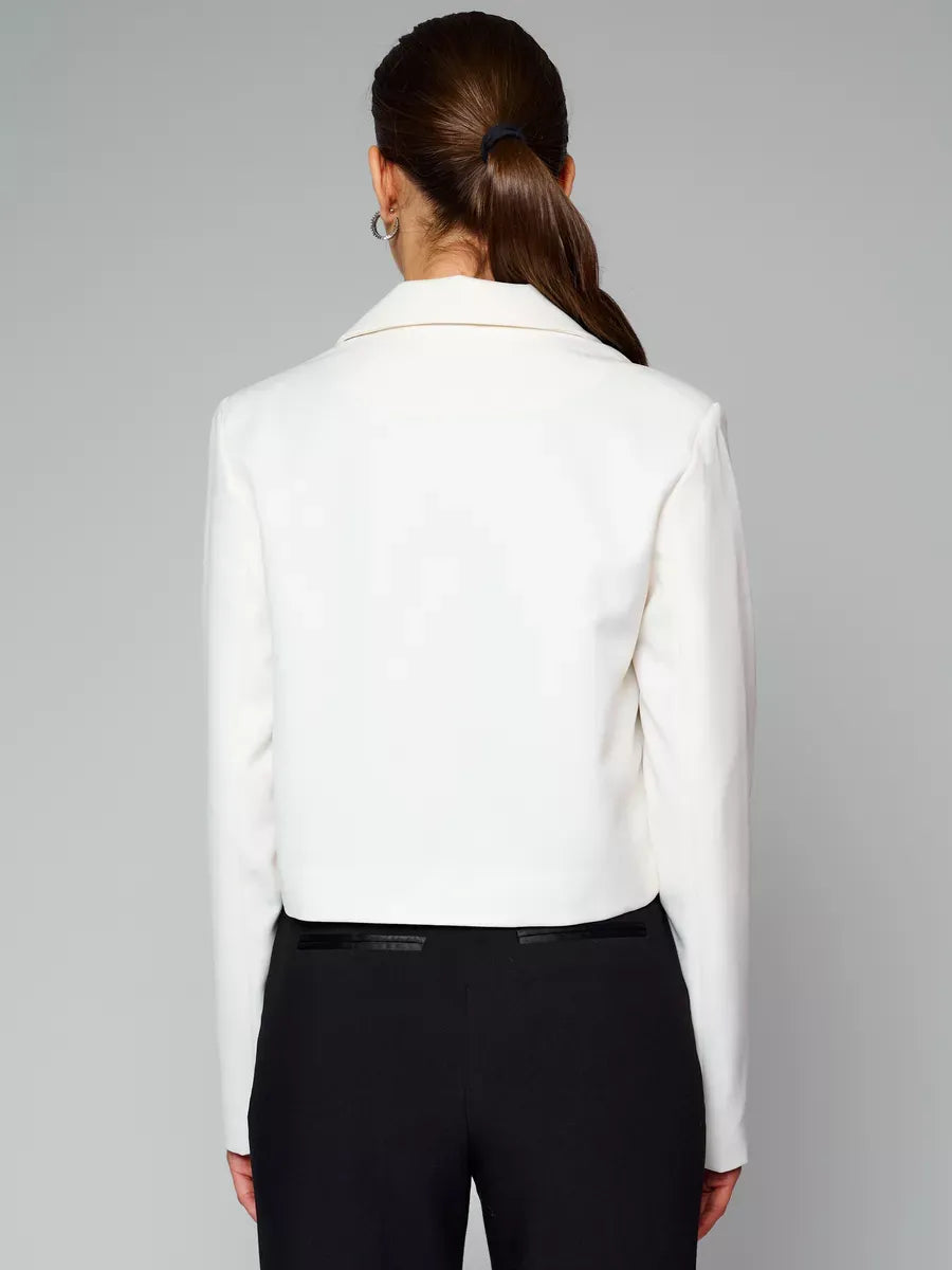 Back view of Luna Blazer, a cropped ivory women's jacket by Lauven, showcasing its oversized fit.