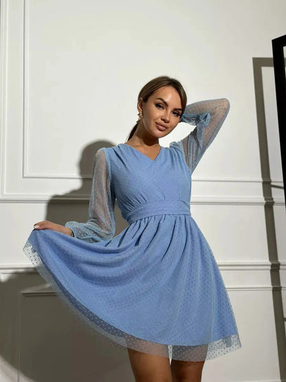 Celeste Mini Dress by Lauven in tiffany blue chiffon with sheer polka dot sleeves and flattering V-neckline.