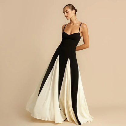 Isla Women's Maxi Dress featuring a black top and flowing cream skirt, perfect for wedding guest or formal occasions.