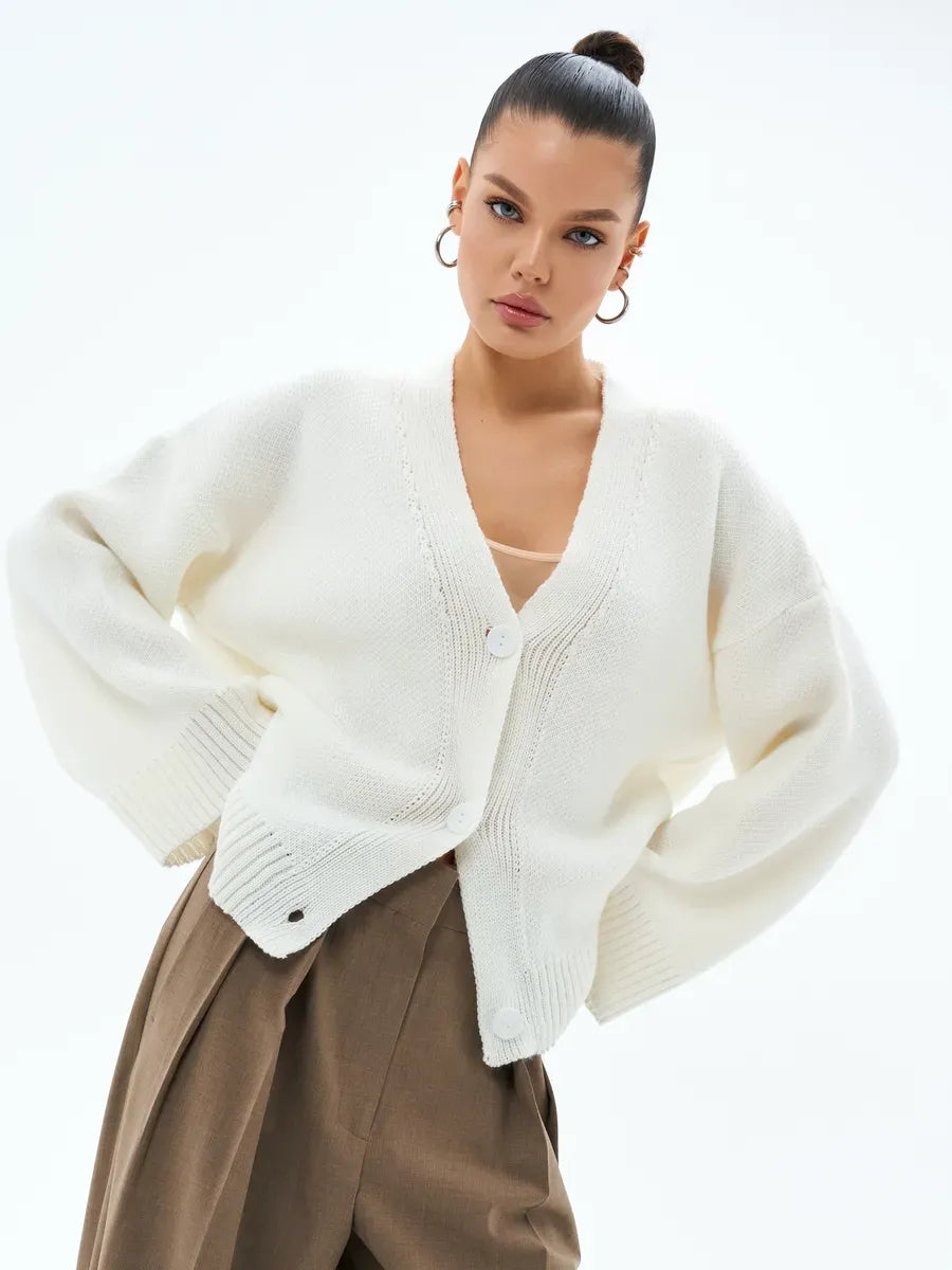 Ivory Cardigan by Lauven - Cozy oversized knitwear with button closure, perfect for layering in cooler seasons.