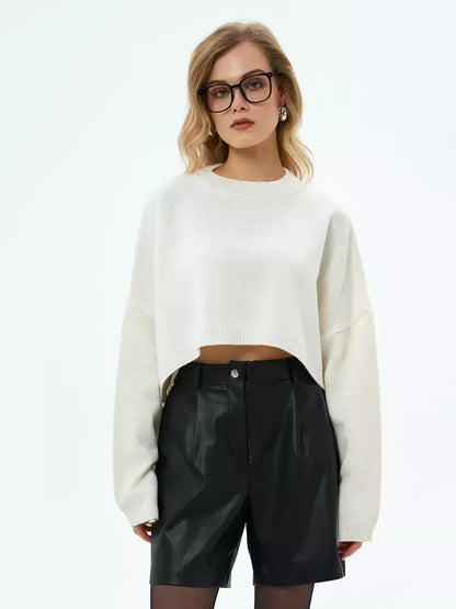 Ivory Sweater by Lauven - Cropped oversized knit in pure white, paired with black shorts for a chic look.