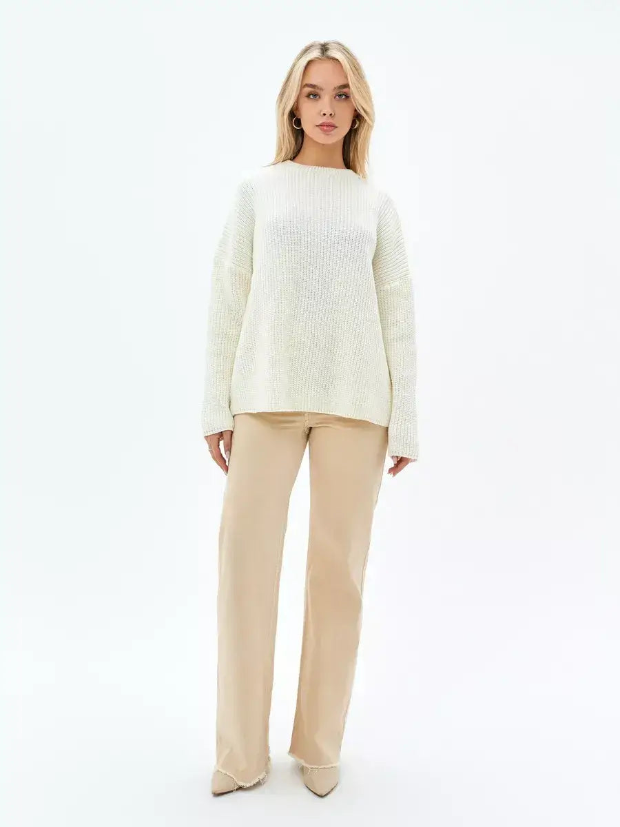 Ivory Sweater by Lauven on model, showcasing an oversized knit with a soft cream hue and elegant style.