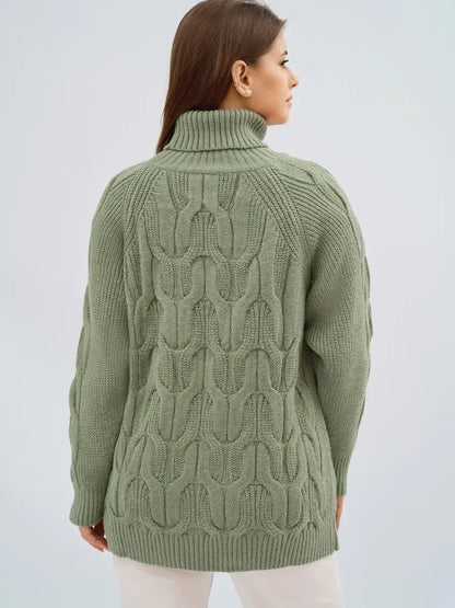Ivy Sweater by Lauven - Oversized cable knit with high neck, showcasing a chic green design from the back.