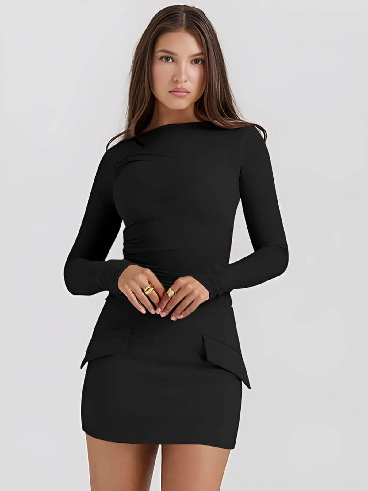 Juno Mini Dress in black, featuring long sleeves and ruched detailing for a chic, bodycon silhouette.