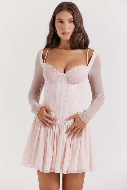 Elegant pink corset mini dress with mesh sleeves perfect for summer events and special occasions.