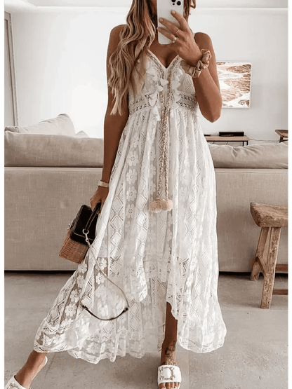 Woman wearing a Lace Muse Maxi Dress with intricate lace details, perfect for boho summer elegance.