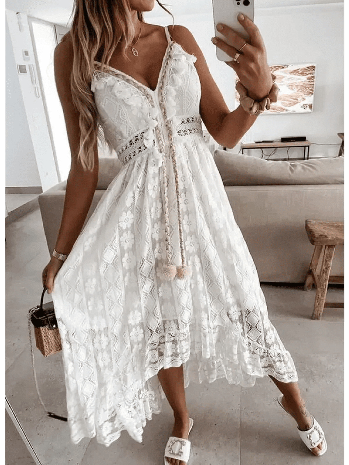 Woman wearing a Lace Muse Maxi Dress featuring intricate lacework and a breezy silhouette, perfect for warm-weather elegance.