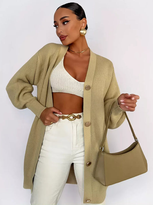 Celeste Cardigan by Lauven - Longline oversized knit in warm beige, styled with a cropped top and chic accessories.