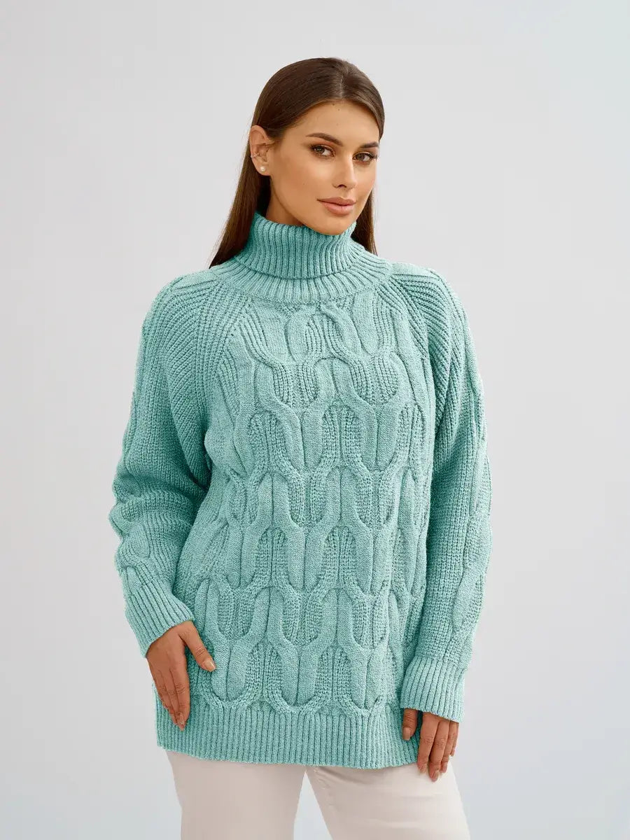 Laguna Sweater by Lauven, a cozy oversized cable knit with high neck in a mint green hue.