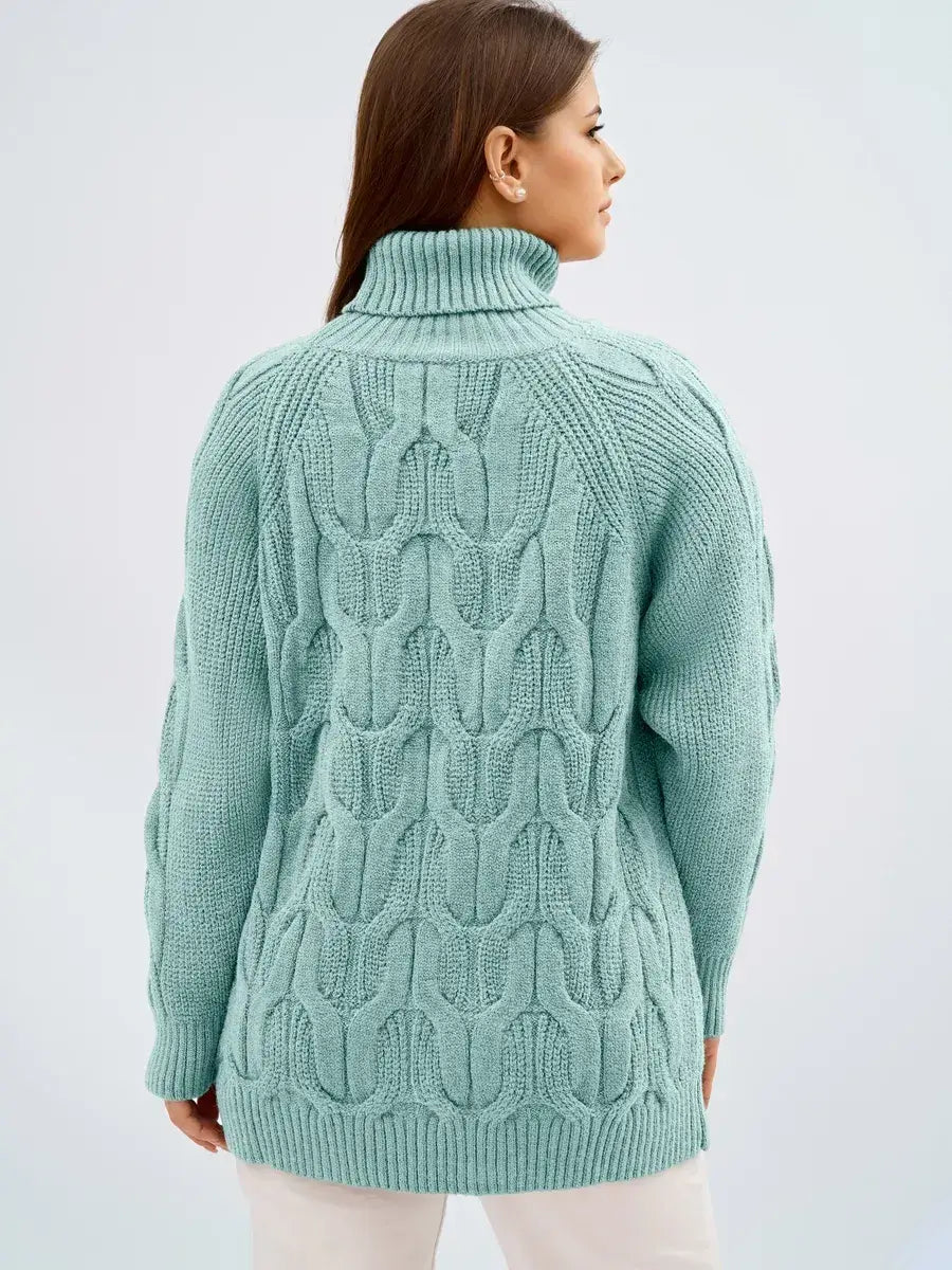 Laguna Sweater by Lauven in soft mint green, showcasing its oversized cable knit and high neck from the back view.