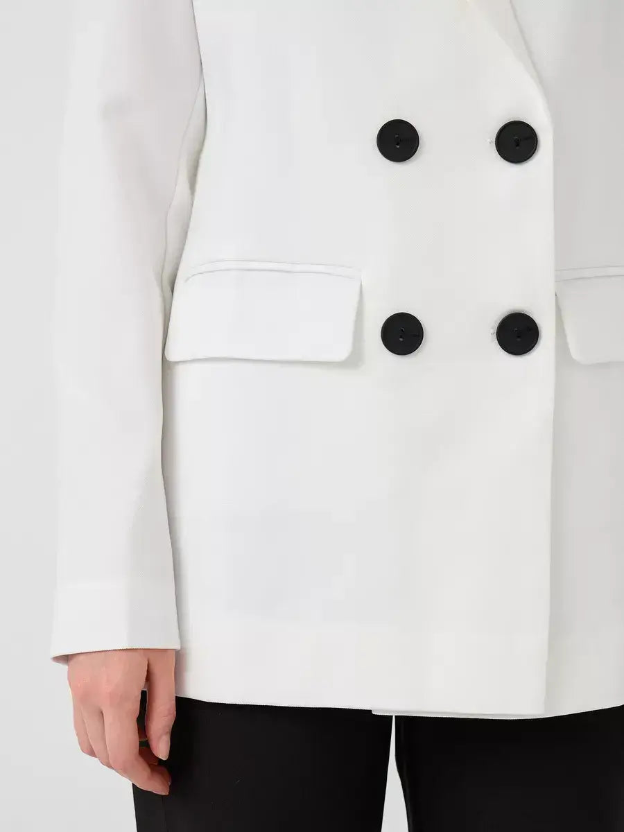 Alabaster Blazer by Lauven, oversized white double-breasted jacket featuring black buttons and stylish pockets.