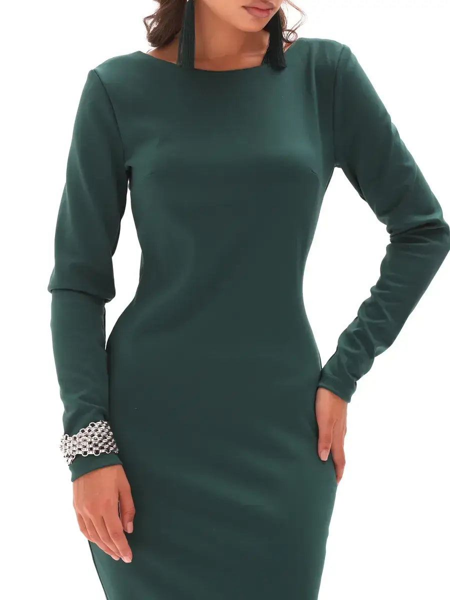 Stylish model showcasing the Aurora Midi Dress by Lauven in elegant emerald green, highlighting sophisticated bodycon fit.