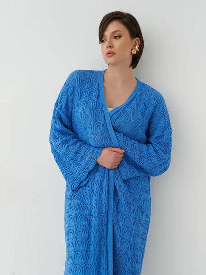 Azure Cardigan by Lauven displayed on a model, showcasing a lightweight openwork knit in dark blue.