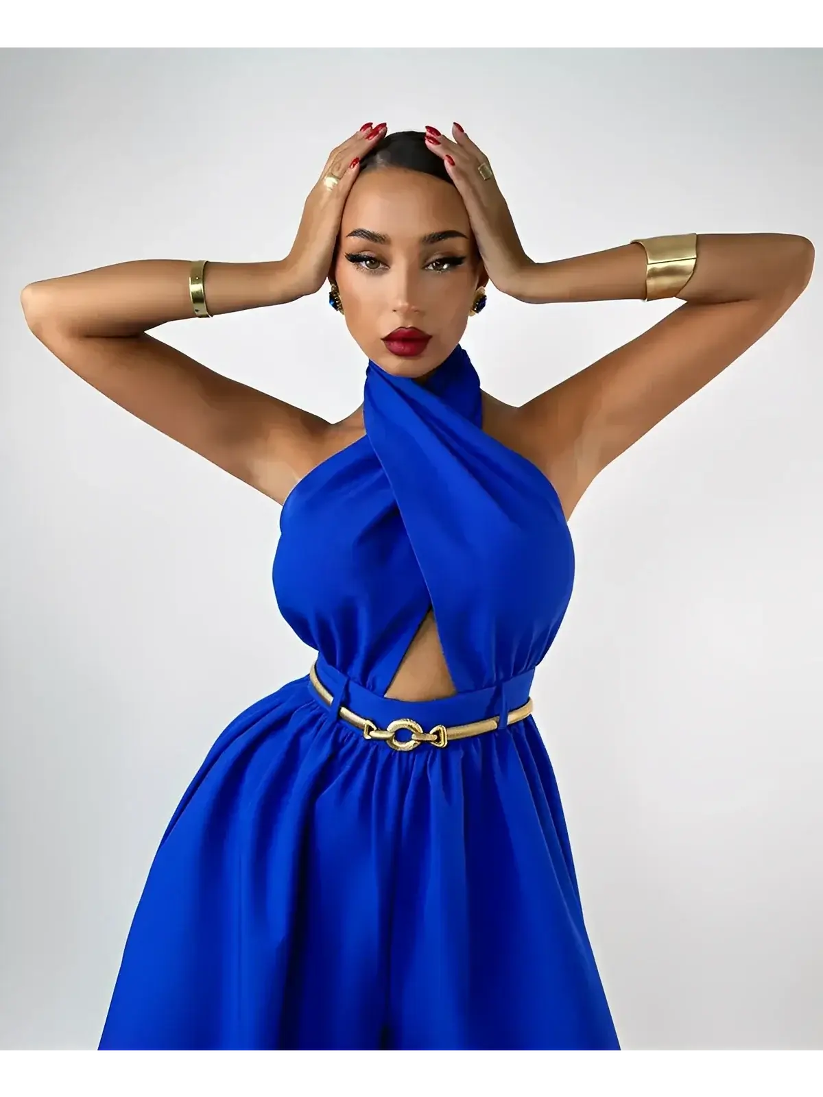 Azure Halter Jumpsuit by Lauven featuring a striking blue color and elegant open-back design.
