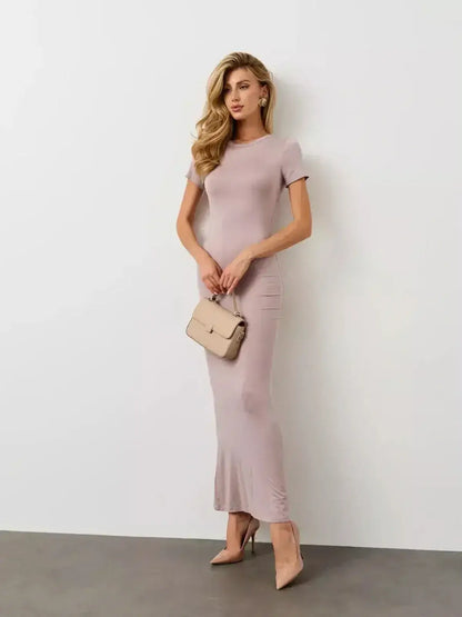 Bare Essence Maxi Dress from Lauven, showcasing a smooth U-neckline and sculpted silhouette in beige.