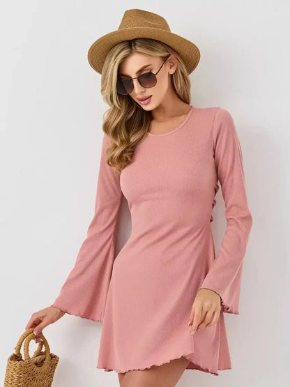 Blush Aura mini dress by Lauven in pink, featuring a U-neckline and flared long sleeves, perfect for summer elegance.