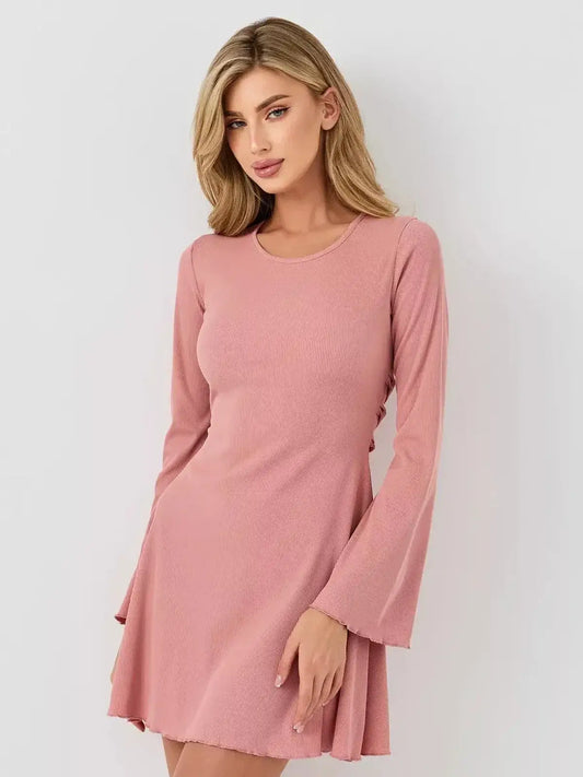 Blush Aura mini dress by Lauven, featuring long flared sleeves and a U-neckline in soft pink.