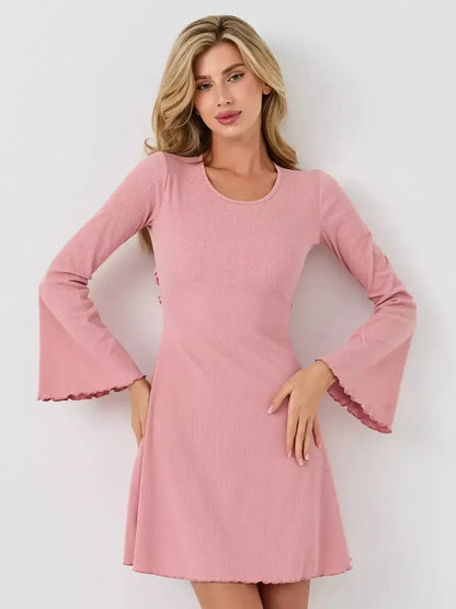 Blush Flare dress by Lauven featuring a flirty A-line silhouette and bell sleeves in soft pink.
