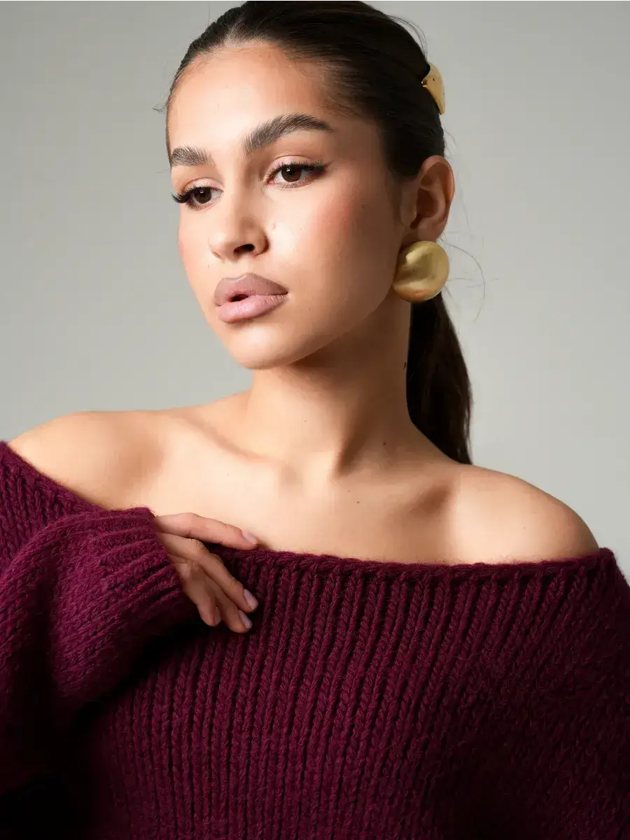 Bordeaux Sweater by Lauven, oversized off-shoulder knit in deep burgundy, combining warmth and elegance.