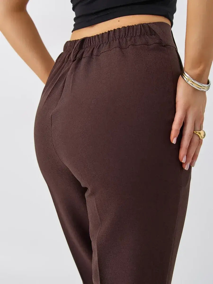 Cacao Suit Set - Close-up of high-waist chocolate pants by Lauven highlighting tailored fit and comfortable waistband.