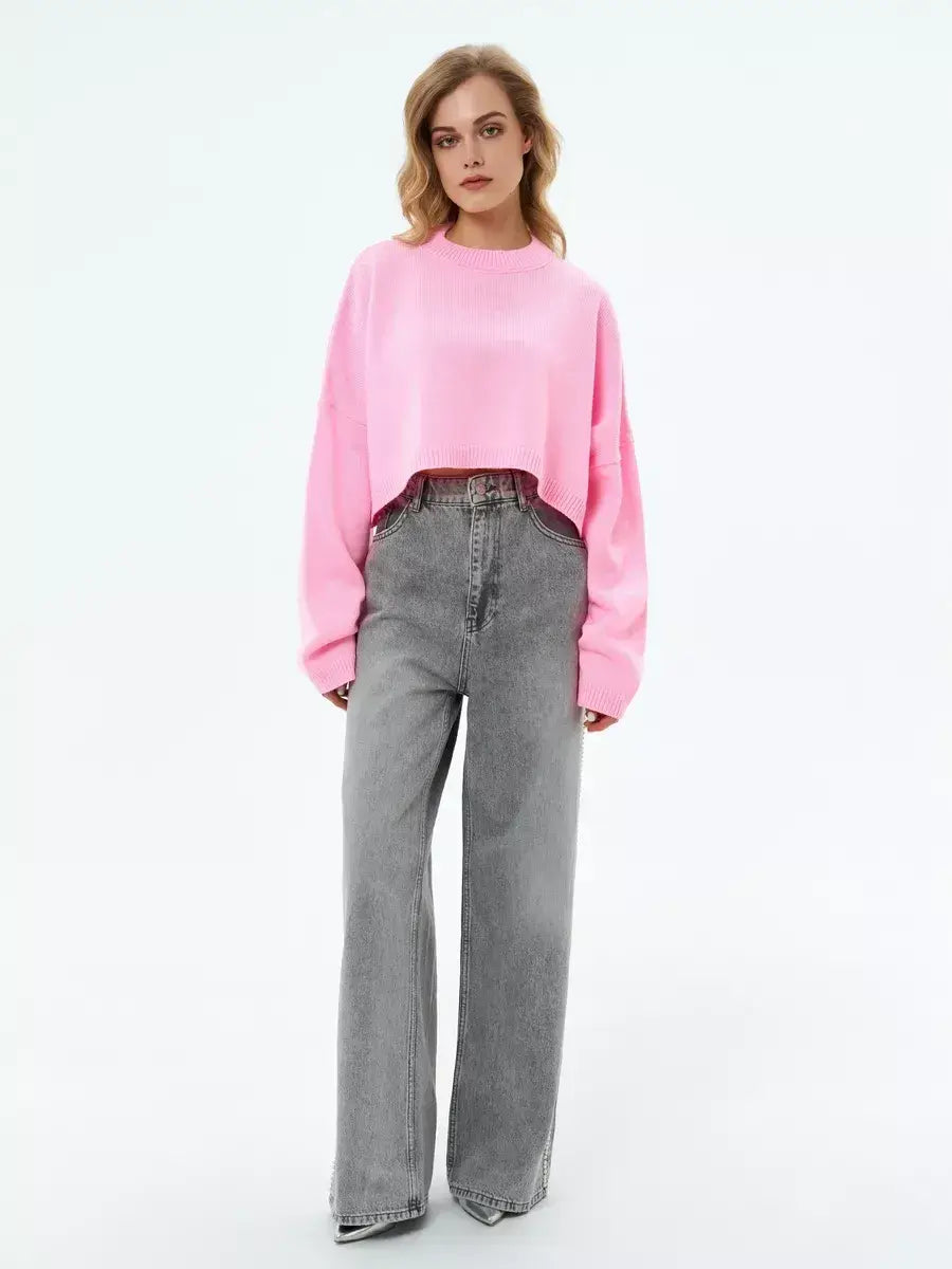 Candy Sweater by Lauven in soft pink, cropped oversized knit, paired with wide-leg jeans.