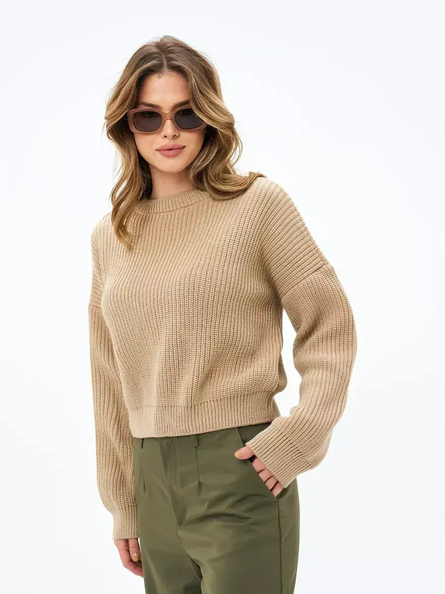 Cappuccino Sweater by Lauven, oversized knit in warm beige, styled with chic sunglasses for a trendy look.