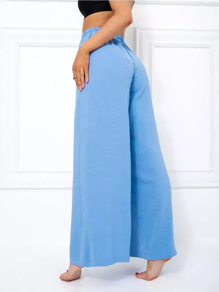 Celeste Suit Set - Elegant wide-leg palazzo pants in soft blue by Lauven, showcasing a modern oversized fit.