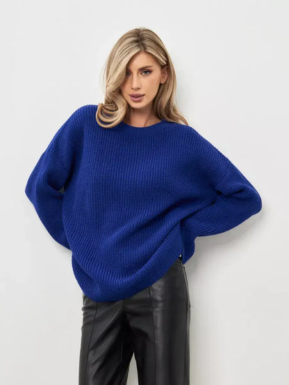 Model wearing a Lauven oversized Celeste Sweater in electric blue with relaxed silhouette and crew neckline