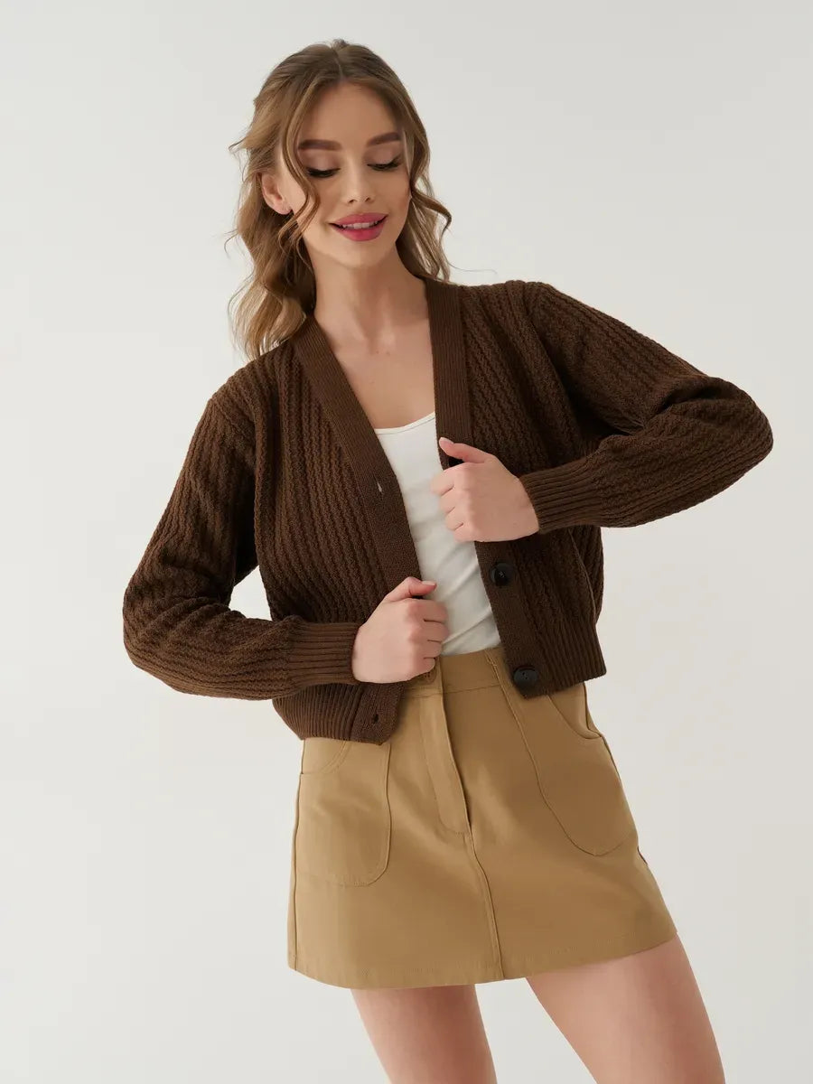 Chestnut Cardigan by Lauven, oversized cropped knitwear in warm brown worn with a skirt for a chic modern look.